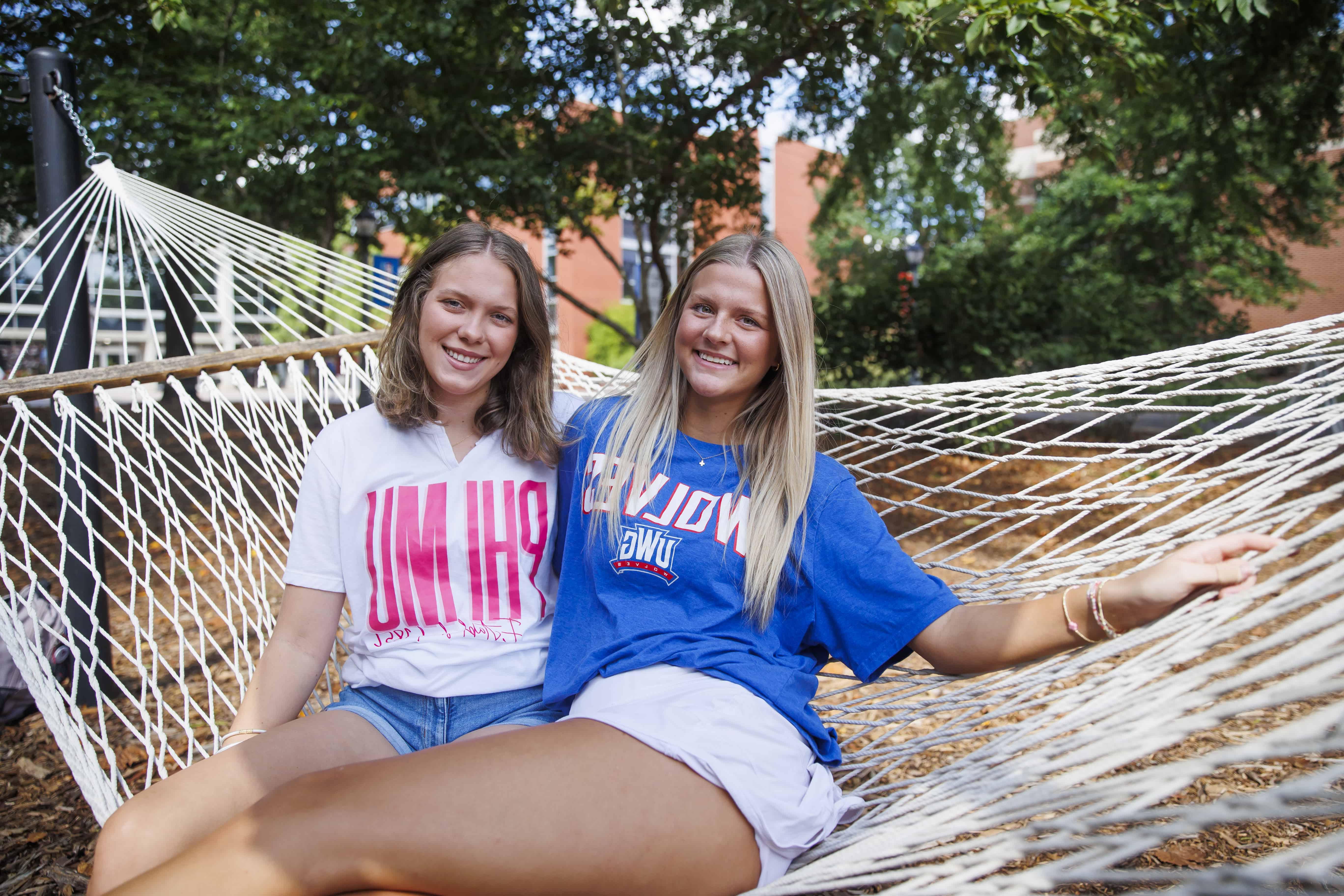 two female students smiling 